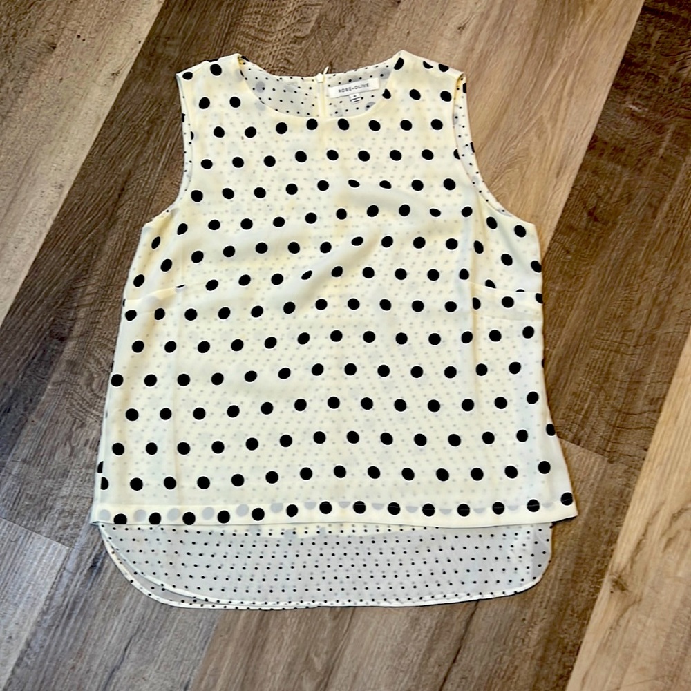 Sleeveless, Polk dot too. Size M